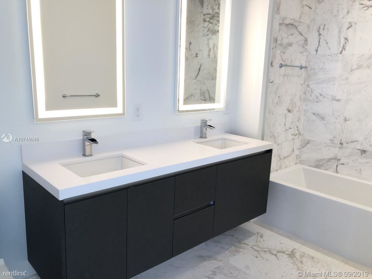 851 NE 1ST AVE - Photo 3 of 7