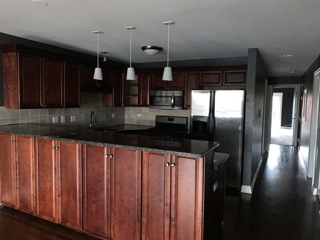 5658 W 63rd St #3W - Photo 2 of 11