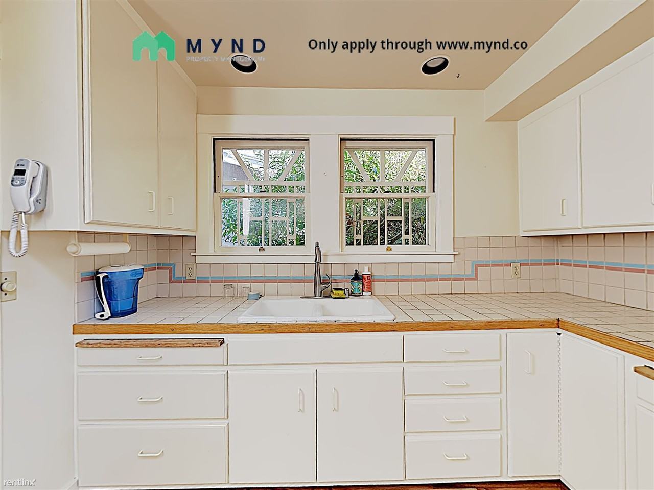 445 42nd St - Photo 2 of 10