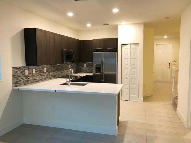 8878 Northwest 103rd Avenue - Photo 3 of 5