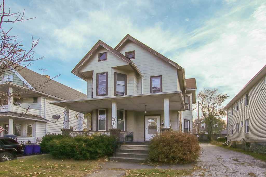1345 W 61st St - Photo 2 of 26