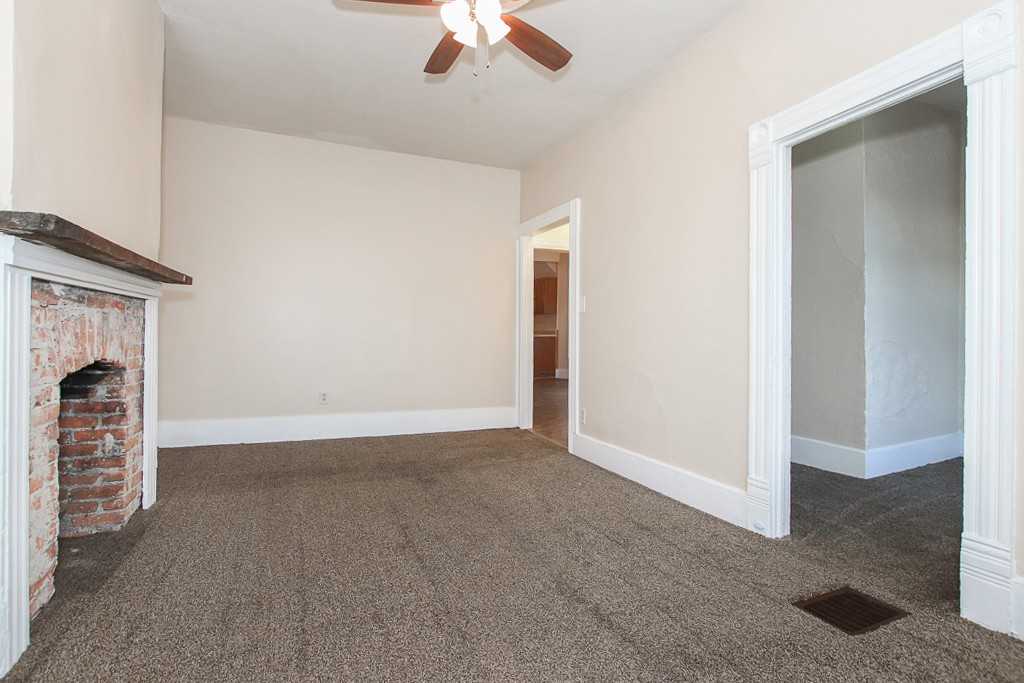 1345 W 61st St - Photo 3 of 26