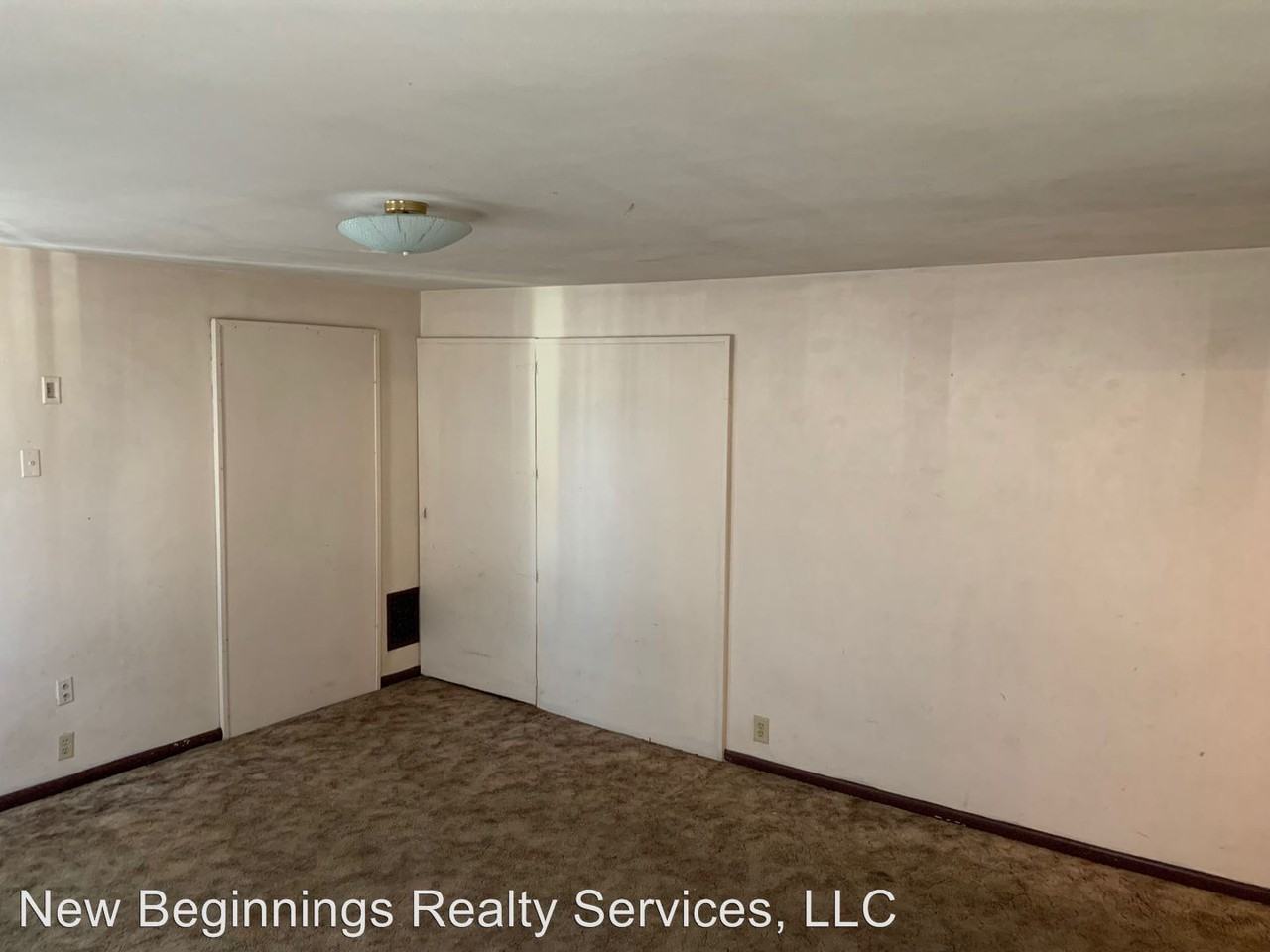 24  Pleasant St - Photo 3 of 4