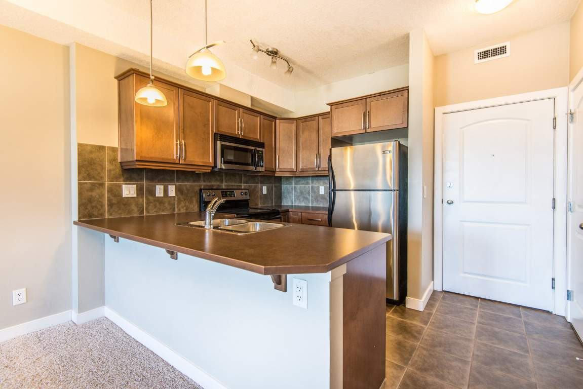 320, 15304 Bannister Road SE Apartments 15304 Solea Condominiums