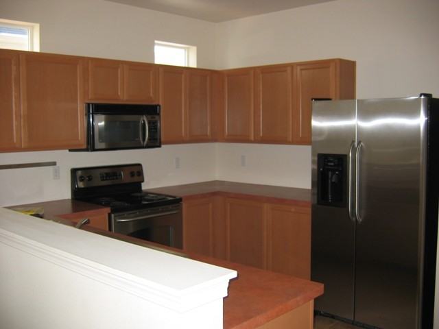 7534 Traditions Ave NE - Photo 2 of 8