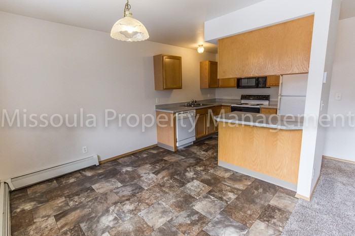 1203 Southwest Higgins Avenue #M - Photo 3 of 13