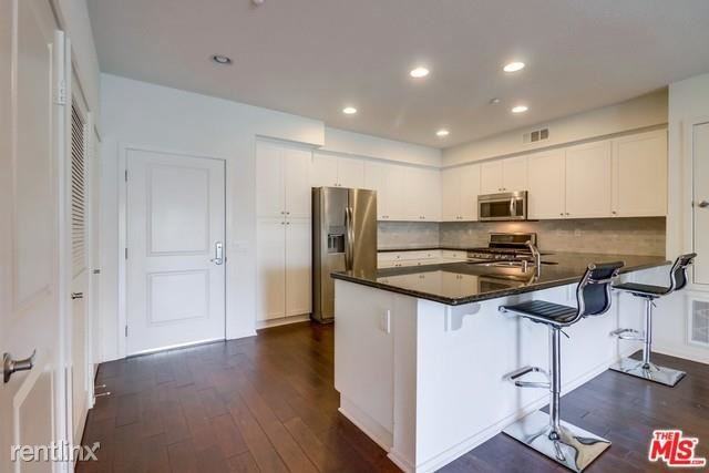 5450 Strand #203 - Photo 2 of 10