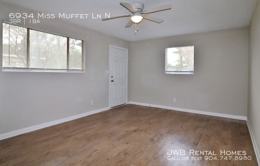 6934 Miss Muffet Ln N - Photo 2 of 9