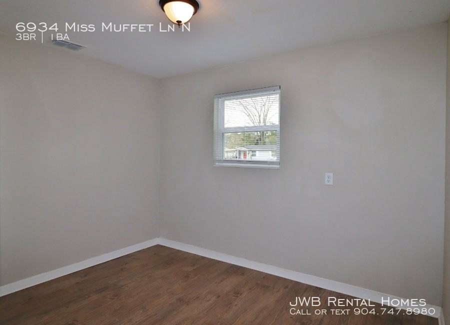 6934 Miss Muffet Ln N - Photo 3 of 9