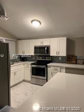 11308 Southwest 112th Circle Lane East - Photo 3 of 5