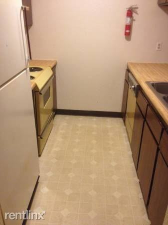 Nicole Apartments - Photo 2 of 4