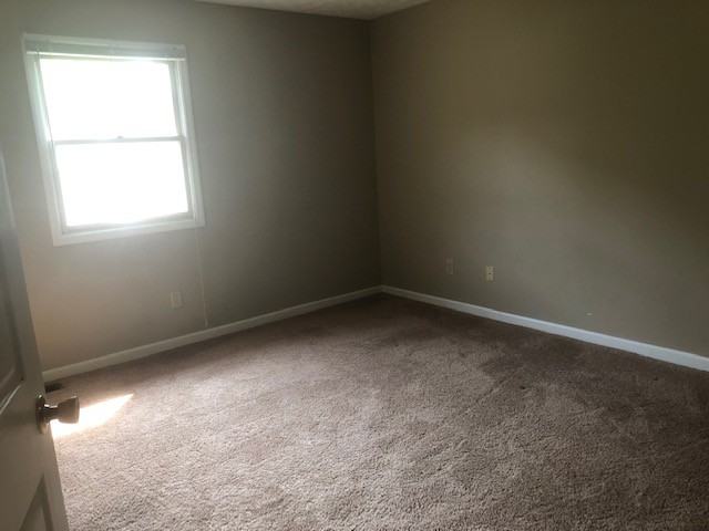 Mayflower Townhomes - Photo 3 of 7
