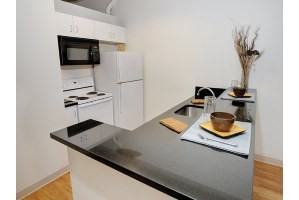 Bank and Boston Lofts Apartments - Photo 2 of 17