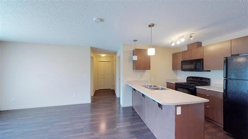 3353 16a Avenue Northwest #308 - Photo 2 of 5