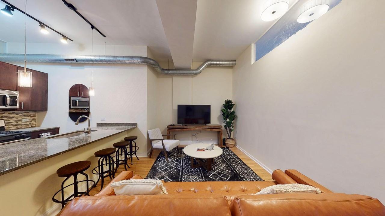 Sleek Logan Square apartment near Blue Line Apartments for  