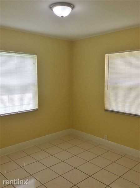 1100 NW 143rd St - Photo 3 of 9