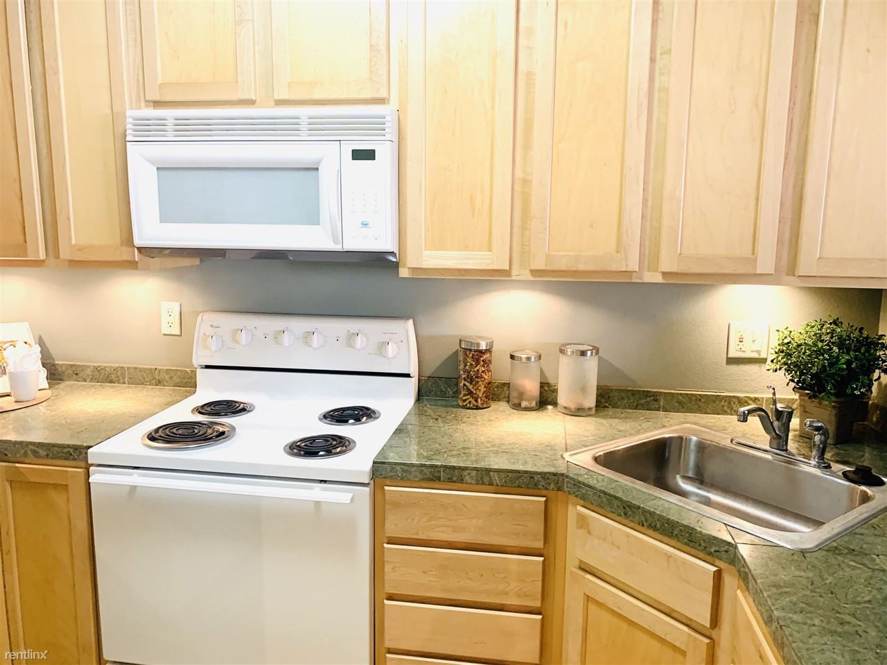 The Village Woods Condominium Complex - Photo 3 of 11