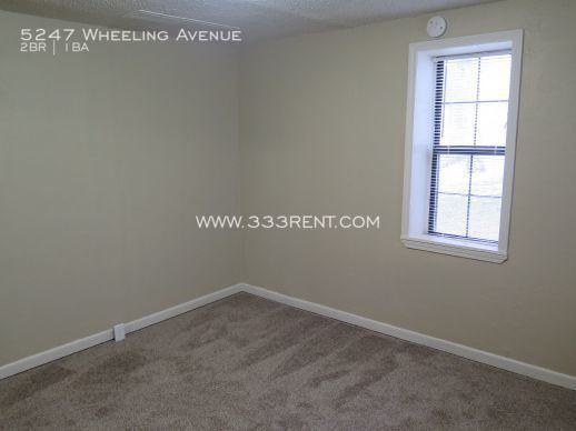 5247 Wheeling Avenue - Photo 3 of 11