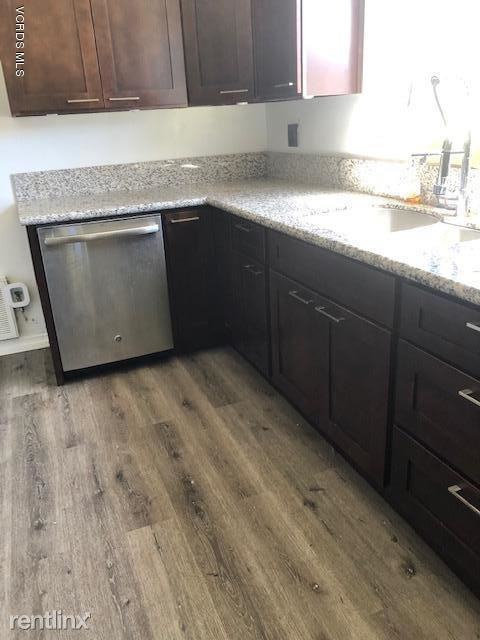 7047 Fallbrook Ave - Photo 3 of 3