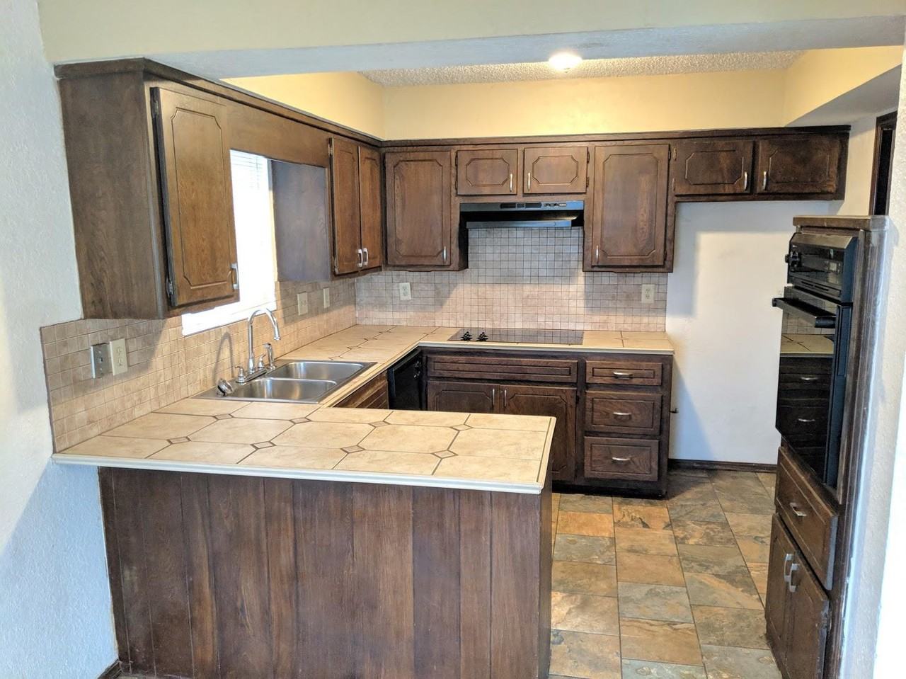 7032 Stonycreek Drive - Photo 2 of 14