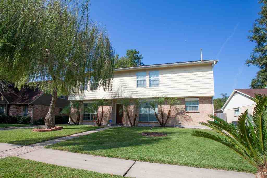 15214 Woodhorn Dr - Photo 2 of 31