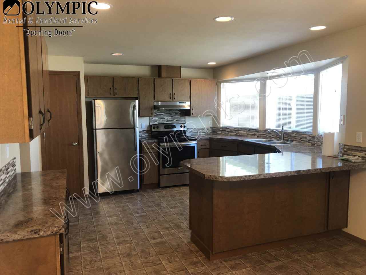 1934 Olympia Ave Ne - Photo 3 of 12