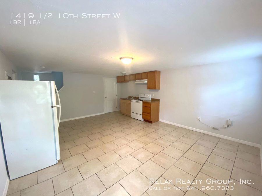 1419 1/2 10th St W - Photo 3 of 6