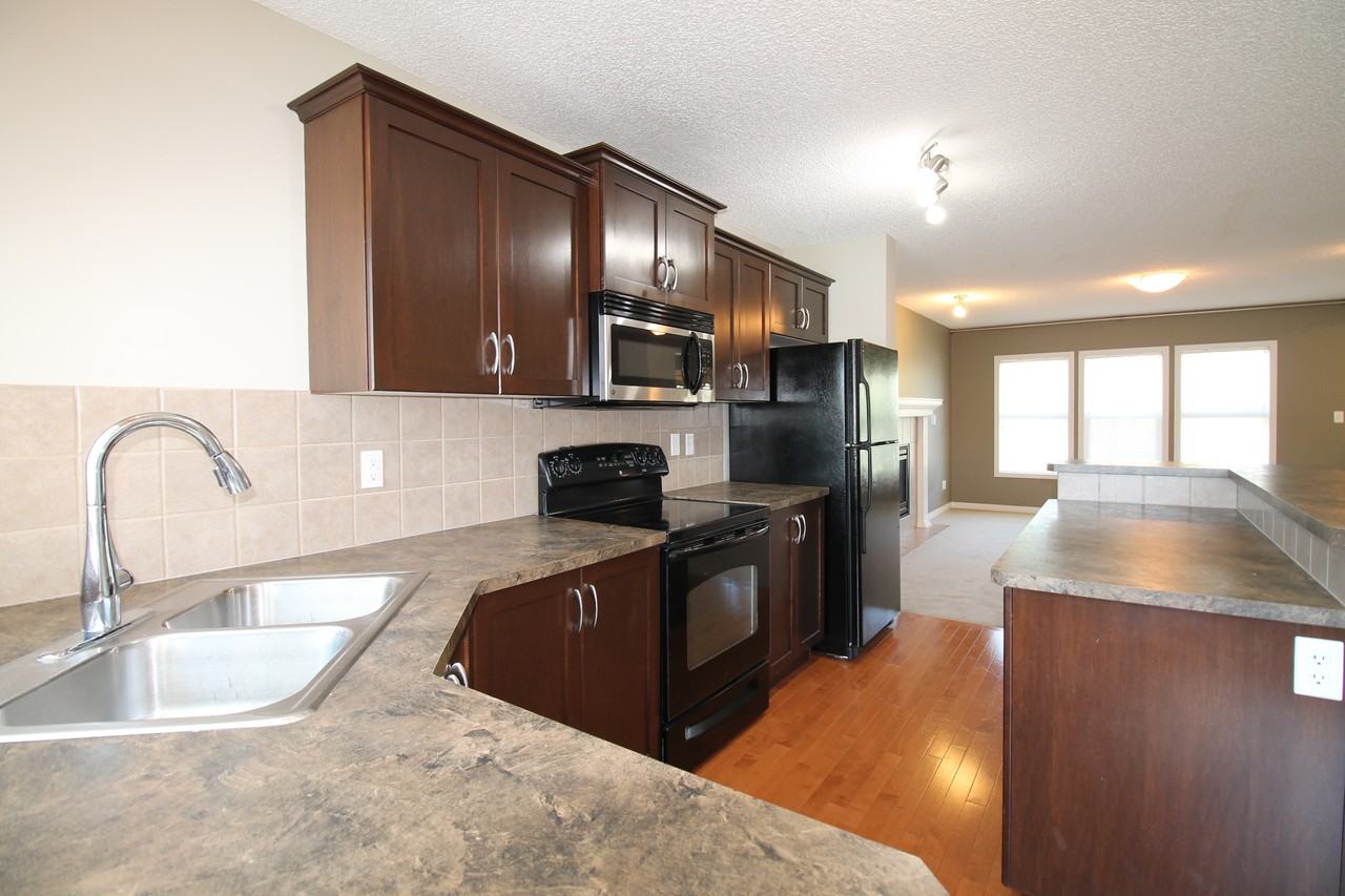 7694 Schmid Cres Nw - Photo 3 of 20