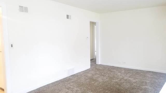 275 N Seymour Ave - Photo 3 of 5