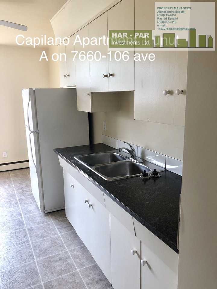 7704 106 Ave NW - Photo 3 of 19