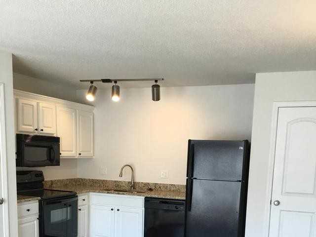 9002 W 64th Ter - Photo 4 of 13