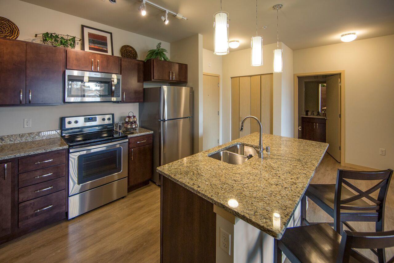 1505 Apartments - Photo 2 of 17