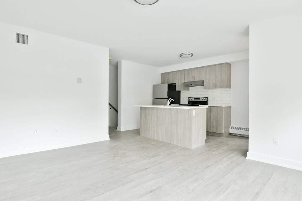 Skyline Stacked Townhomes - Photo 3 of 36