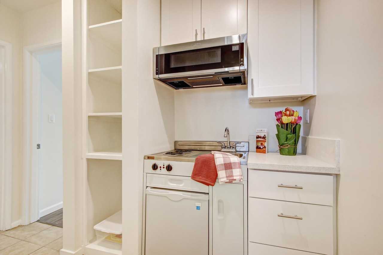 Woodman Apartments - Photo 4 of 63