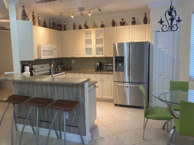 7888 Southwest 166th Place - Photo 2 of 20