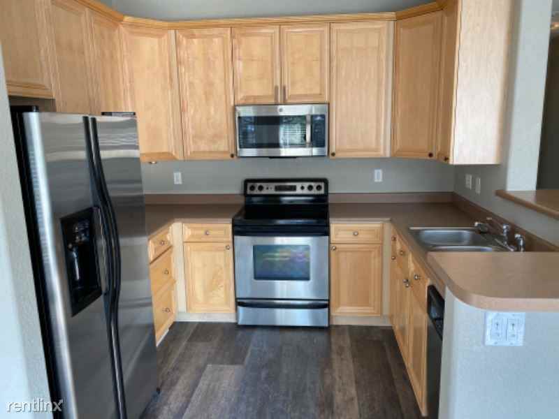 8497 8497 S Hoyt Way 207 - Photo 2 of 17