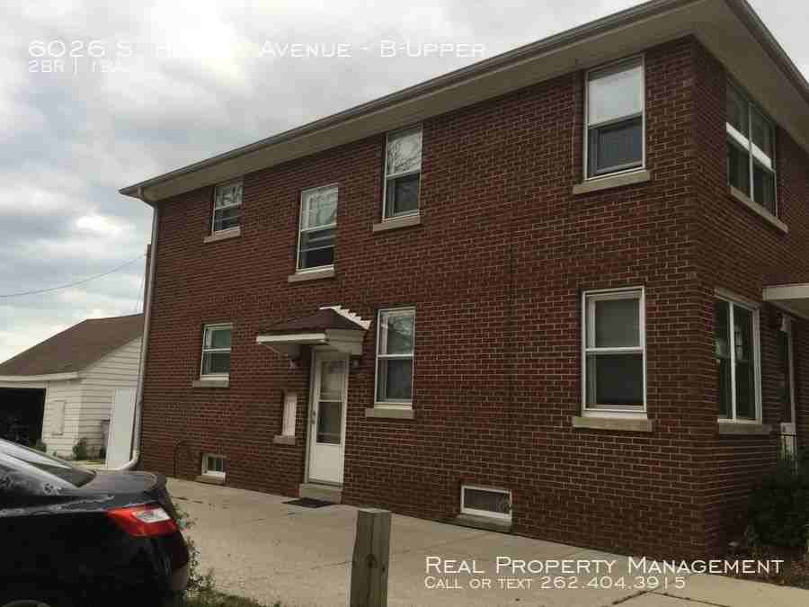 6026 S Howell Ave - Photo 3 of 5