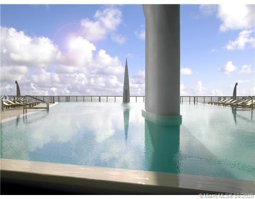 JADE OCEAN CONDO - Photo 2 of 12