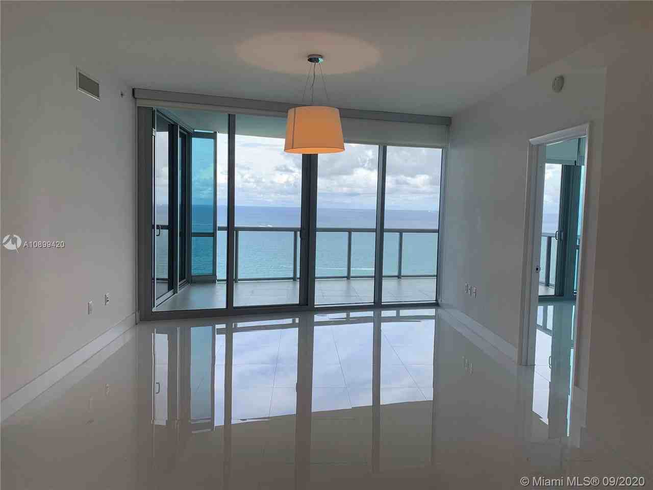 JADE OCEAN CONDO - Photo 3 of 12