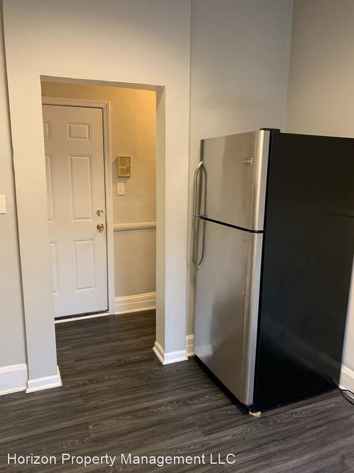 Woodhome Flats - Photo 2 of 14