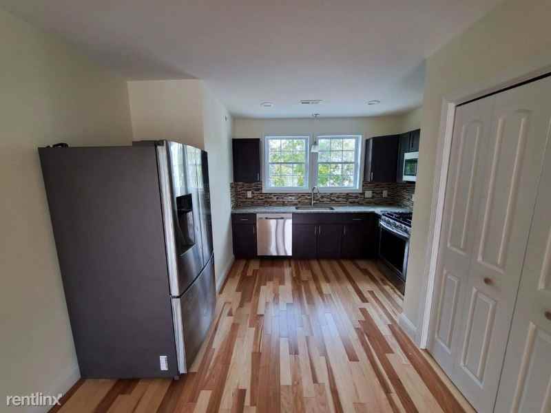 50-60 Village Green South 11 - Photo 2 of 17