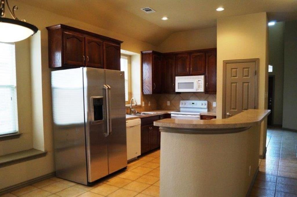 10108 Coolidge Dr - Photo 3 of 15