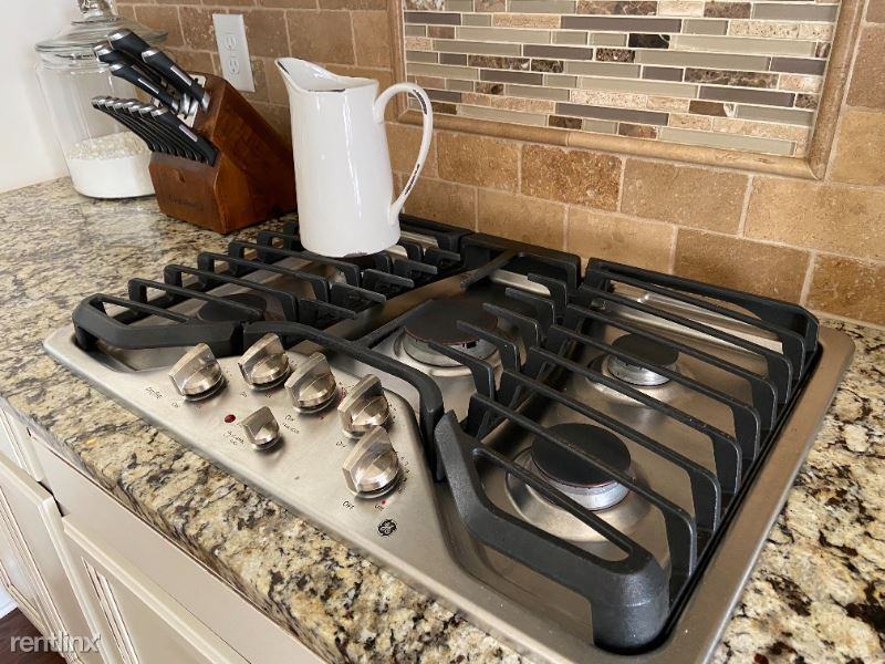 9610 Camberley Ave Nw - Photo 2 of 5