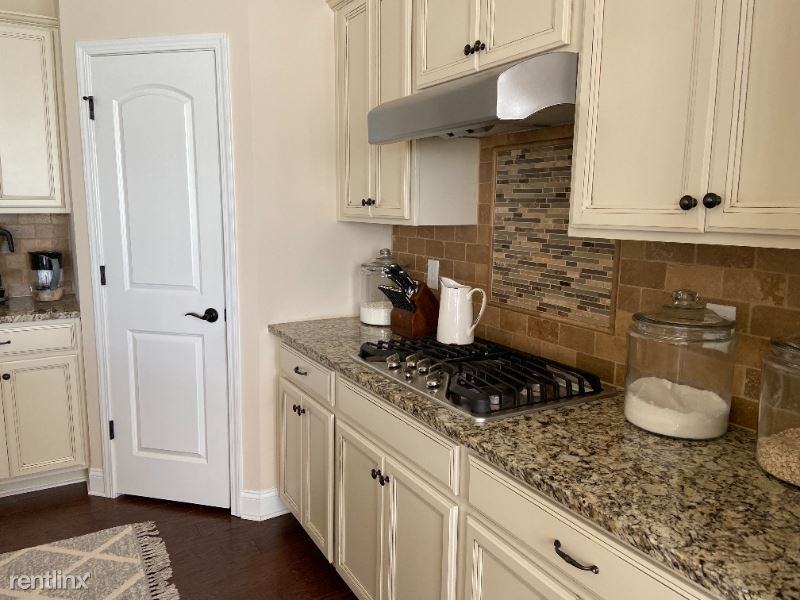 9610 Camberley Ave Nw - Photo 3 of 5