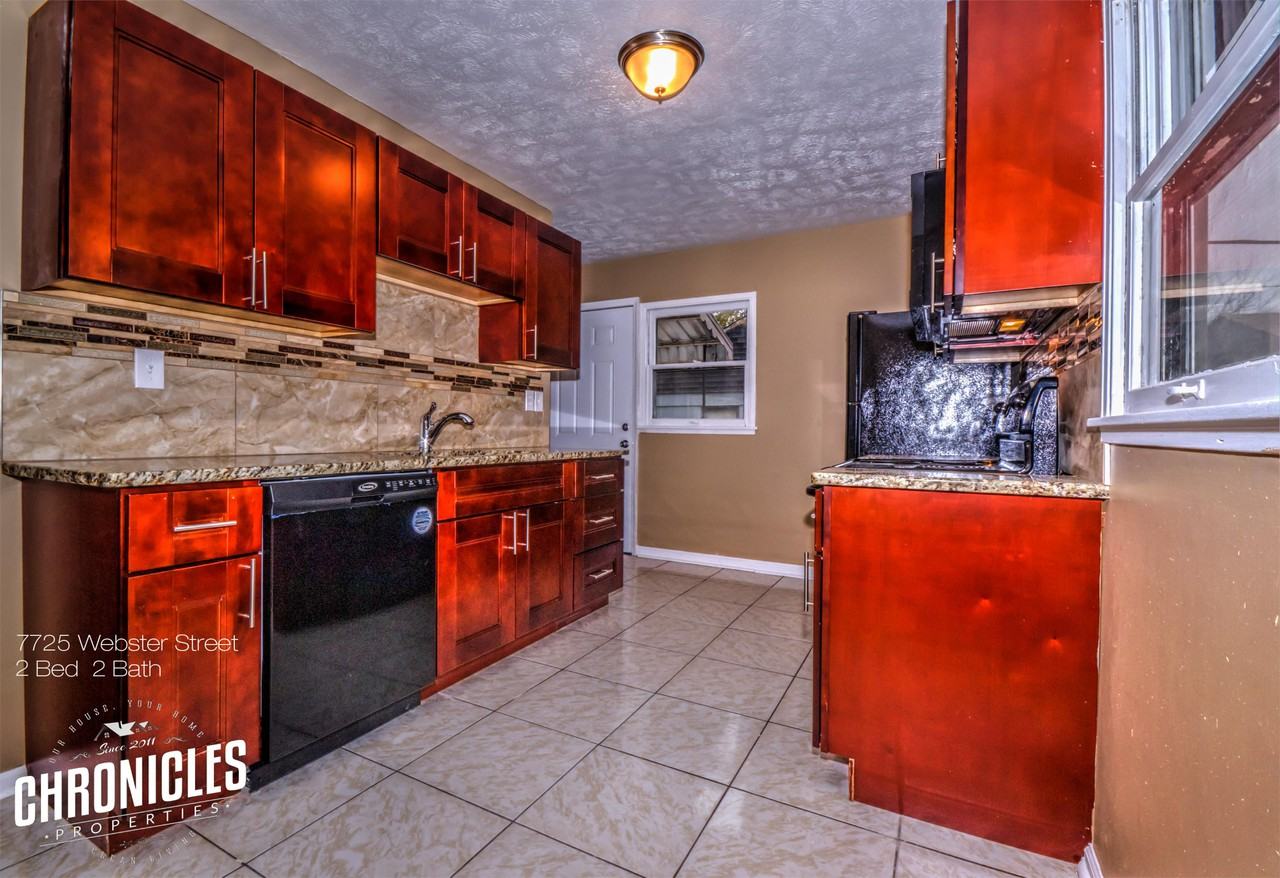 7725 Webster St - Photo 2 of 8