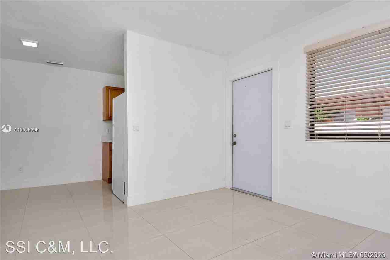 1911 NW 30 ST - Photo 3 of 7