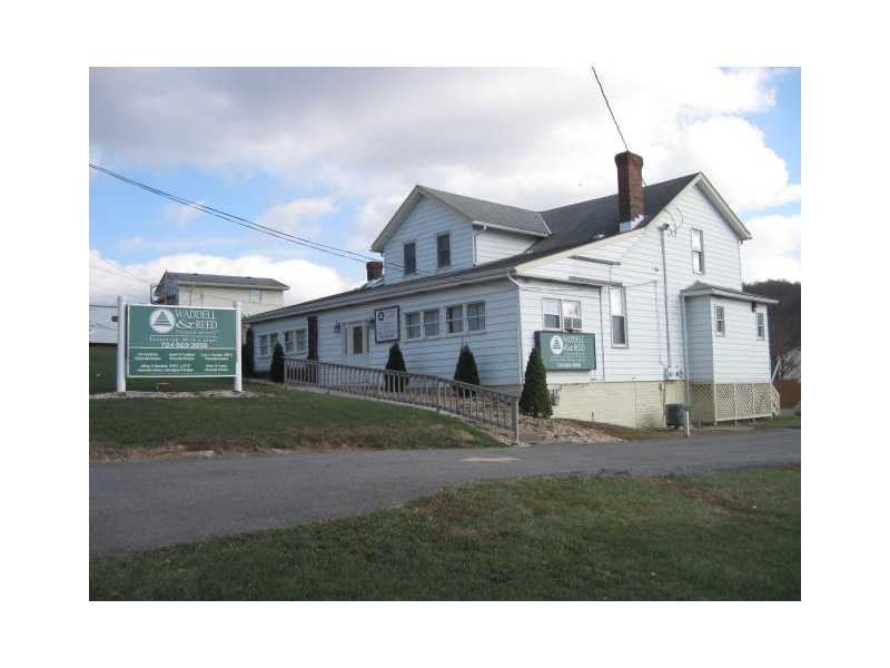 1028 Rostraver Rd - Photo 2 of 25