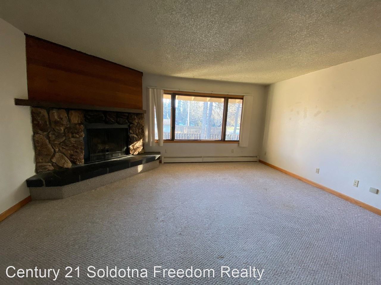 1207 4TH Ave 1-4 - Photo 2 of 4