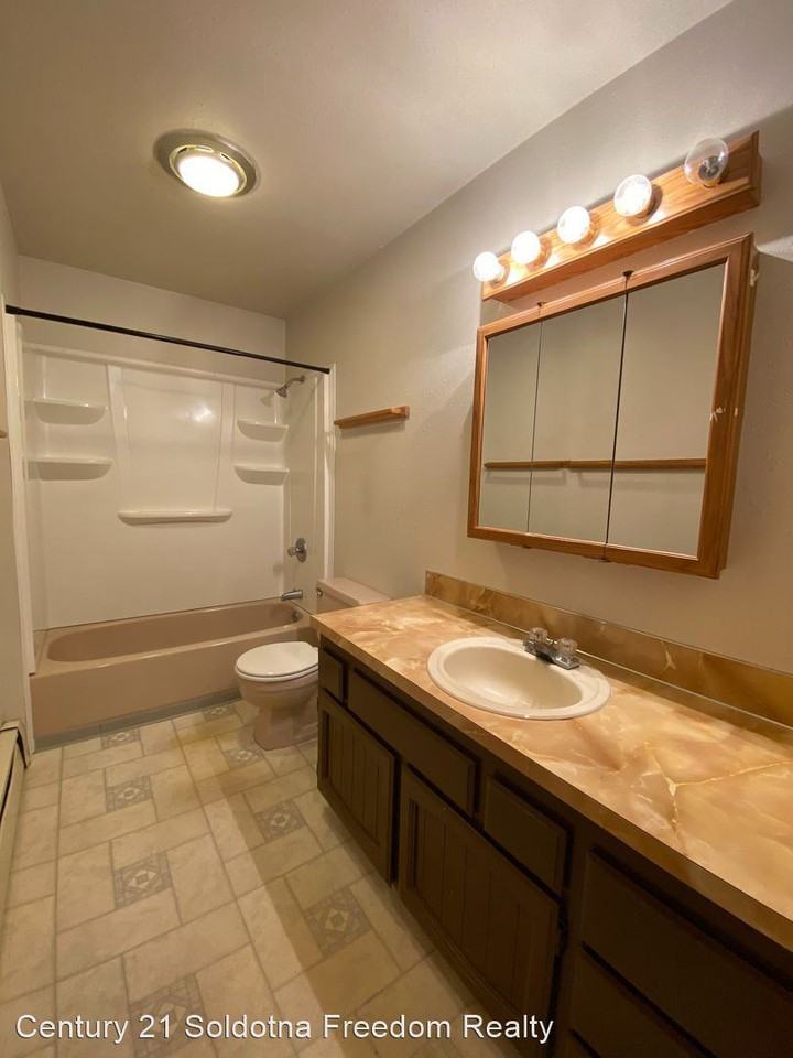 1207 4TH Ave 1-4 - Photo 3 of 4