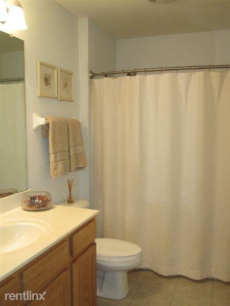 Spring Creek Condos - Photo 3 of 17